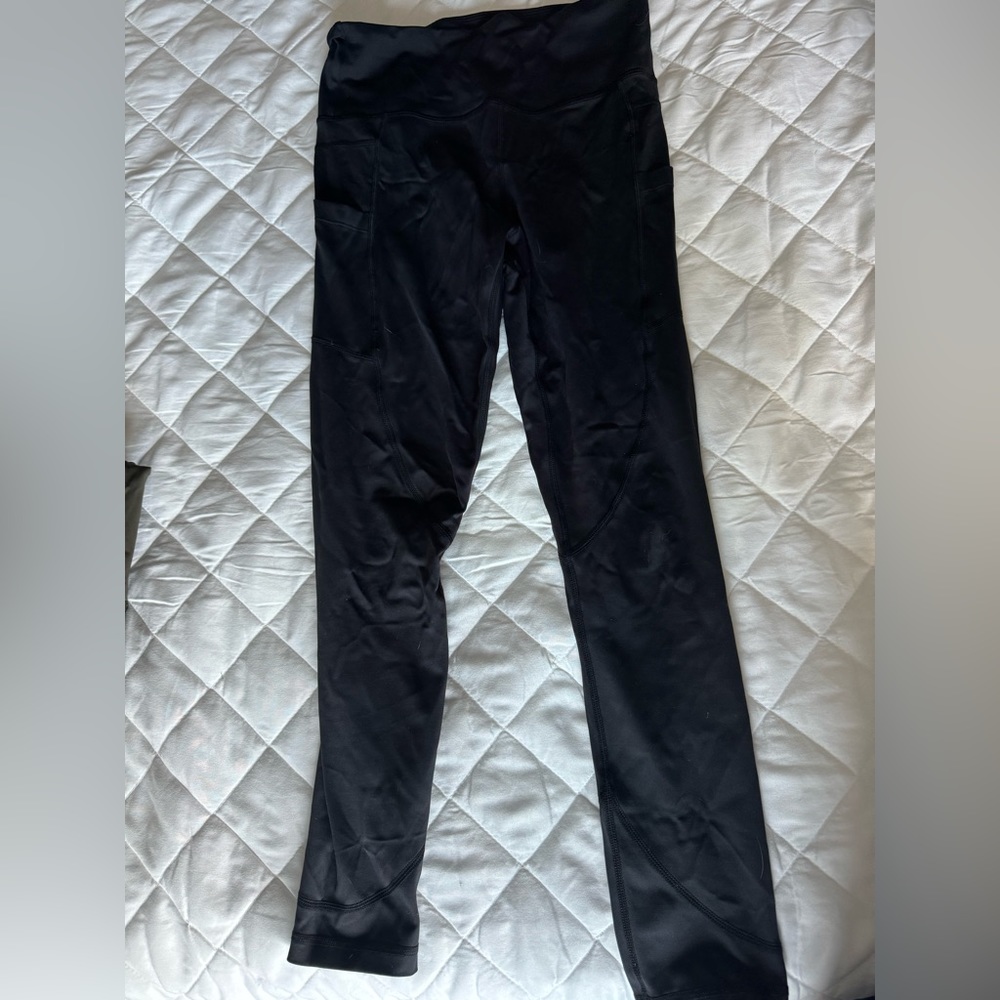 Zyia black pocket leggings . Size medium (6-8)